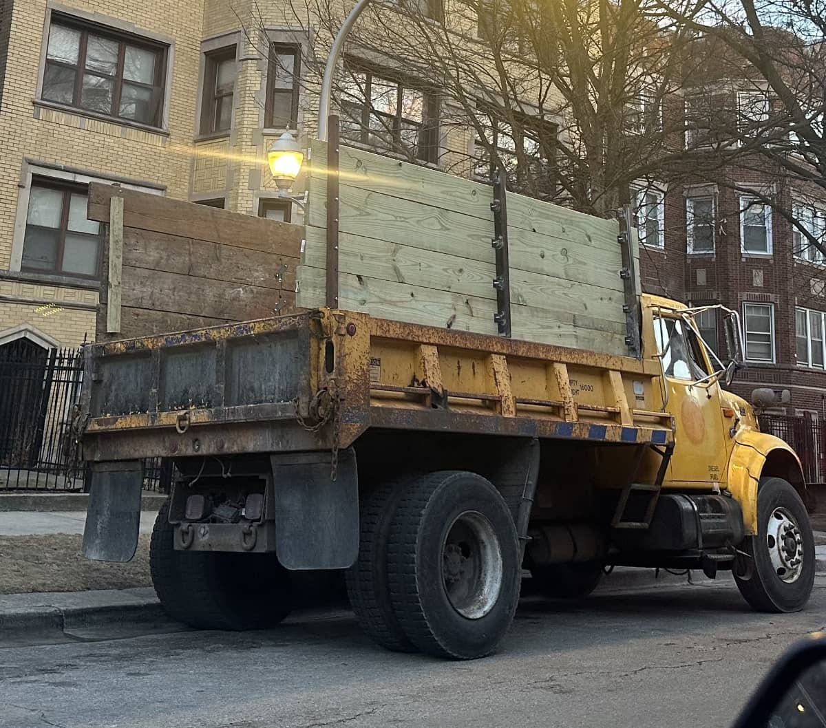 dump truck hauling away junk