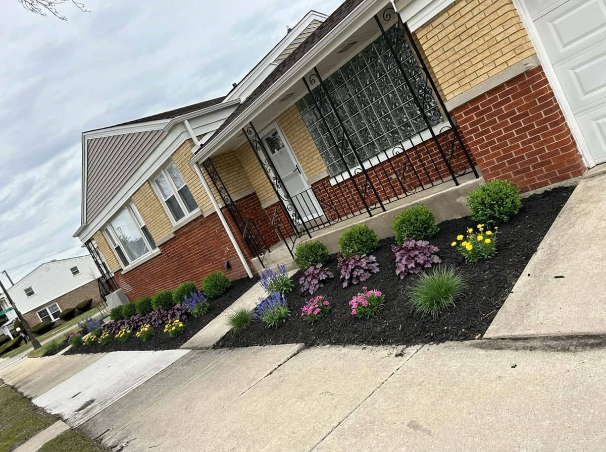 fresh mulch with new colorful plants installed