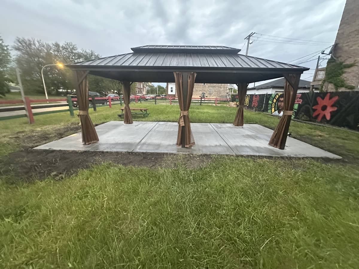 pergola installation in backyard